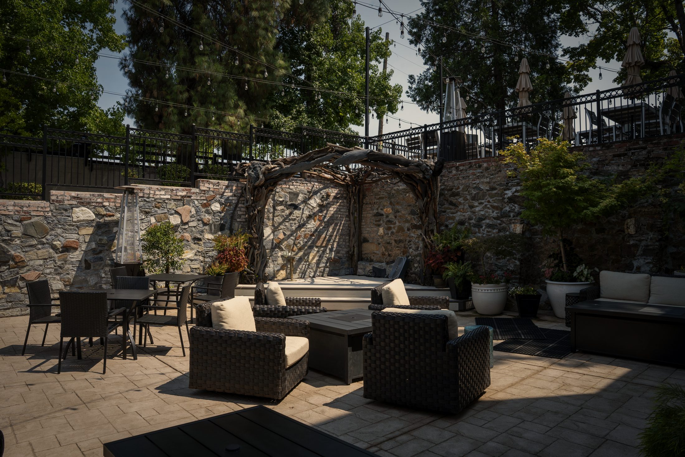 The Lounge courtyard under string lights